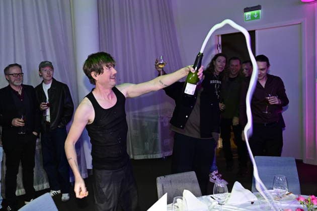 MALMÖ, SWEDEN 20260221 Timo Räisänen sprays champagne at the after-party after round 4 of Melodifestivalen 2026 in Malmö Arena on Saturday MALMÖ SWEDEN x50090x  Copyright: xJohanxNilsson TTx MELODIFESTIVALEN 2026 MALMÖ OF3wF9012Zo