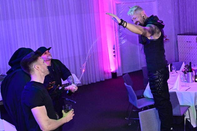 MALMÖ, SWEDEN 20260221 Smash Into Pieces singer Chris Adam sprays champagne on guitarist Benjamin Jennebo at the after party after round 4 of Melodifestivalen 2026 in Malmö Arena on Saturday MALMÖ SWEDEN x50090x  Copyright: xJohanxNilsson TTx MELODIFESTIVALEN 2026 MALMÖ ZOHNOD19Nw8