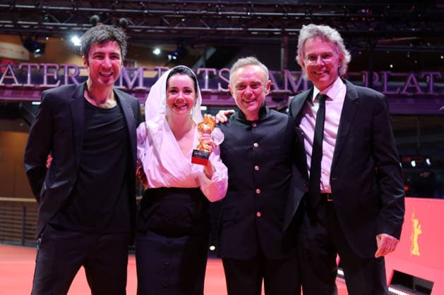 February 21, 2026, Berlin, Germany: Ilker Catak, with cast and crew pose with the Golden Bear for Best Film for Gelbe Briefe (Yellow Letters) after the closing ceremony of the 76th Berlin International Film Festival (Berlinale), Europe s first major film festival of the year, in Berlin. The festival runs from February 12 to 22, 2026. Berlin Germany - ZUMAf146 20260221_zip_f146_001 Copyright: xRouzbehxFouladix