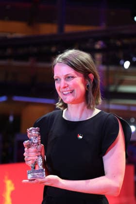 February 21, 2026, Berlin, Germany: Director Genevieve Dulude-de Celles poses with the Silver Bear for Best Screenplay for Nina Roza after the closing ceremony of the 76th Berlin International Film Festival (Berlinale), Europe s first major film festival of the year, in Berlin. The festival runs from February 12 to 22, 2026. Berlin Germany  - ZUMAf146 20260221_zip_f146_026 Copyright: xRouzbehxFouladix