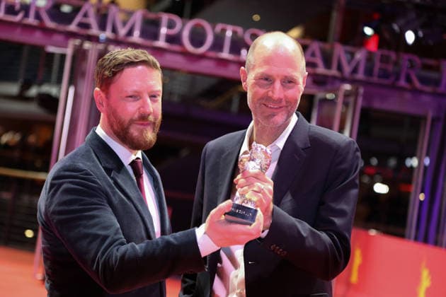 February 21, 2026, Berlin, Germany: Tristan Goligher (L) and Lance Hammer pose with the Silver Bear Jury Prize for Queen at Sea after the closing ceremony of the 76th Berlin International Film Festival (Berlinale), Europe s first major film festival of the year, in Berlin. The festival runs from February 12 to 22, 2026. Berlin Germany  - ZUMAf146 20260221_zip_f146_036 Copyright: xRouzbehxFouladix