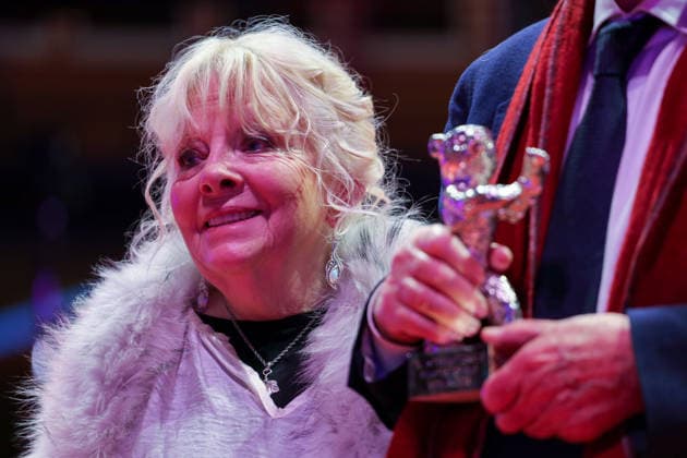 February 21, 2026, Berlin, Germany: Anna Calder-Marshall (L) and Tom Courtenay pose with the Silver Bear for Best Supporting Performance for Queen at Sea after the closing ceremony of the 76th Berlin International Film Festival (Berlinale), Europe s first major film festival of the year, in Berlin. The festival runs from February 12 to 22, 2026. Berlin Germany  - ZUMAf146 20260221_zip_f146_038 Copyright: xRouzbehxFouladix