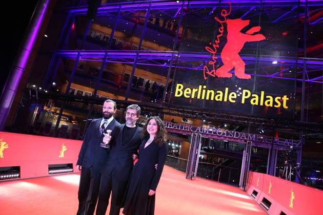 February 21, 2026, Berlin, Germany: Director Emin Alper poses with the Silver Bear Grand Jury Prize for Salvation after the closing ceremony of the 76th Berlin International Film Festival (Berlinale), Europe s first major film festival of the year, in Berlin. The festival runs from February 12 to 22, 2026. Berlin Germany  - ZUMAf146 20260221_zip_f146_042 Copyright: xRouzbehxFouladix