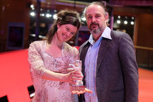 February 21, 2026, Berlin, Germany: Anna Fitch (L) and Banker White pose with the Silver Bear for Outstanding Artistic Contribution for Yo (Love is a Rebellious Bird) after the closing ceremony of the 76th Berlin International Film Festival (Berlinale), Europe s first major film festival of the year, in Berlin. The festival runs from February 12 to 22, 2026. Berlin Germany - ZUMAf146 20260221_zip_f146_037 Copyright: xRouzbehxFouladix