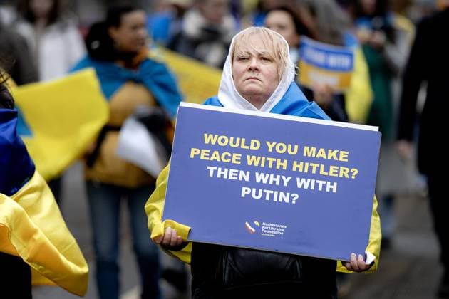 AMSTERDAM Participants in a solidarity march for Ukraine walk from Museumplein to Dam Square, where a commemoration ceremony was held. February 24 marks the fourth anniversary of Russia s invasion of Ukraine. RAMON VAN FLYMEN ANP netherlands out - belgium out  Copyright: xx x551453654x originalFilename: 551453654.jpg