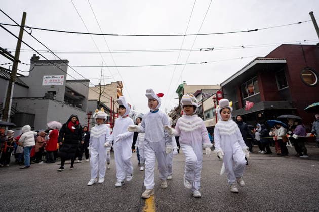 February 22, 2026, Vancouver, Bc, CANADA: Children dressed in horse costumes walk during the annual Spring Festival Parade through Chinatown for the Lunar New Year in Vancouver, on Sunday, Feb. 22, 2026. Vancouver CANADA  - ZUMAc35_ 20260222_zaf_c35_170 Copyright: xEthanxCairnsx