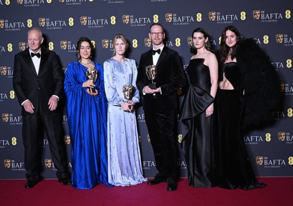 Swedish actor Stellan Skarsgard, Norwegian film producers Maria Ekerhovd and Andrea Berentsen Ottmar, director Joachim Trier, actresses Inga Ibsdotter Lilleaas and Renate Reinsve attend the Winners Room at the EE BAFTA Film Awards at the Royal Festival Hall in London, England on Sunday, February 22, 2026.  LON202602221120 RUNExHELLESTAD