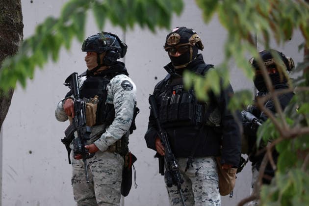 Security presence in Mexico City following killing of cartel leader El Mencho MEXICO CITY, MEXICO - FEBRUARY 22: Members of the National Guard stand guard outside the facilities of the Specialized Prosecutor s Office for Organized Crime (FEMDO) in Mexico City, Mexico on February 22, 2026. The security presence outside the FEMDO facilities follows an operation earlier in the day in which cartel leader Nemesio Oseguera Cervantes, known as El Mencho was killed during a military operation in Tapalpa, in the state of Jalisco, authorities confirmed. Daniel Cardenas Anadolu Mexico City Mexico. Editorial use only. Please get in touch for any other usage.  Copyright: x2026xAnadoluxDanielxCardenasx