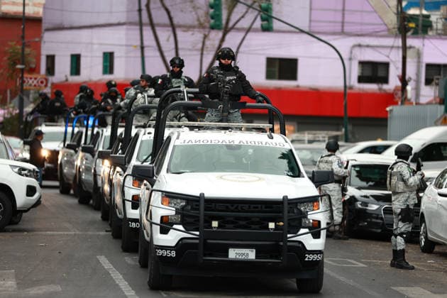 Security presence in Mexico City following killing of cartel leader El Mencho MEXICO CITY, MEXICO - FEBRUARY 22: Members of the National Guard stand guard outside the facilities of the Specialized Prosecutor s Office for Organized Crime (FEMDO) in Mexico City, Mexico on February 22, 2026. The security presence outside the FEMDO facilities follows an operation earlier in the day in which cartel leader Nemesio Oseguera Cervantes, known as El Mencho was killed during a military operation in Tapalpa, in the state of Jalisco, authorities confirmed. Daniel Cardenas Anadolu Mexico City Mexico. Editorial use only. Please get in touch for any other usage.  Copyright: x2026xAnadoluxDanielxCardenasx