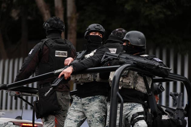 Security presence in Mexico City following killing of cartel leader El Mencho MEXICO CITY, MEXICO - FEBRUARY 22: Members of the National Guard stand guard outside the facilities of the Specialized Prosecutor s Office for Organized Crime (FEMDO) in Mexico City, Mexico on February 22, 2026. The security presence outside the FEMDO facilities follows an operation earlier in the day in which cartel leader Nemesio Oseguera Cervantes, known as El Mencho was killed during a military operation in Tapalpa, in the state of Jalisco, authorities confirmed. Daniel Cardenas Anadolu Mexico City Mexico. Editorial use only. Please get in touch for any other usage.  Copyright: x2026xAnadoluxDanielxCardenasx