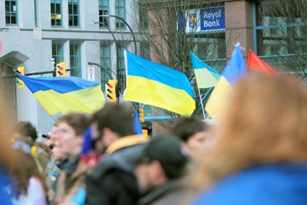 February 22, 2026, Vancouver, Bc, Canada: Ukrine flag in Global Rally For Ukraine.Global Rally For Ukraine marking four years since Russia s full-scale invasion,taking place on February 22 at 2:00 PM at the vancouver Art Gallery. Vancouver Canada  - ZUMAa223 20260222_zip_a223_001 Copyright: xMazyarxAsadix