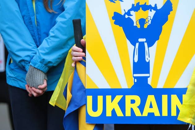 February 22, 2026, Vancouver, Bc, Canada: A woman holding Placard in Global Rally For Ukraine.Global Rally For Ukraine marking four years since Russia s full-scale invasion,taking place on February 22 at 2:00 PM at the vancouver Art Gallery. Vancouver Canada - ZUMAa223 20260222_zip_a223_015 Copyright: xMazyarxAsadix
