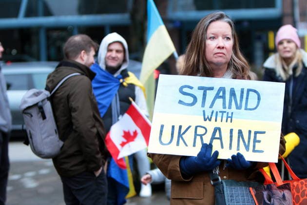 February 22, 2026, Vancouver, Bc, Canada: A woman holding Placard in Global Rally For Ukraine.Global Rally For Ukraine marking four years since Russia s full-scale invasion,taking place on February 22 at 2:00 PM at the vancouver Art Gallery. Vancouver Canada  - ZUMAa223 20260222_zip_a223_020 Copyright: xMazyarxAsadix