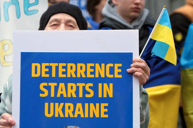 February 22, 2026, Vancouver, Bc, Canada: A man holding Placard in Global Rally For Ukraine.Global Rally For Ukraine marking four years since Russia s full-scale invasion,taking place on February 22 at 2:00 PM at the vancouver Art Gallery. Vancouver Canada  - ZUMAa223 20260222_zip_a223_044 Copyright: xMazyarxAsadix