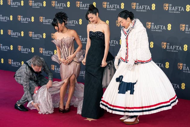 February 22, 2026, London, United Kingdom: Rei Ami, Audrey Nuna and EJAE attend the 2026 EE BAFTA Film Awards held at The Royal Festival Hall. London United Kingdom - ZUMAs197 20260222_aaa_s197_465 Copyright: xLounisxTiarx
