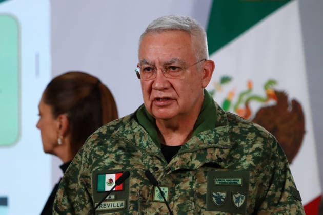 Mexico™s President Claudia Sheinbaum Holds El Mencho News Conference Minister of Mexican National Defense, Ricardo Trevilla Trejo speaks during a news conference about the death of Nemesio Oseguera, know El Mencho, leader of the Jalisco Nueva Generacion Cartel, during an operation in Tapalpa, Jalisco, which sparked roadblocks and vehicle burnings in various parts of the country. on February 23, 2026 in Mexico City, Mexico. (Photo by Carlos Santiago Eyepix Group) Copyright: xCarlosxSantiagox xEyepixxGroupx CS_23022026_176465