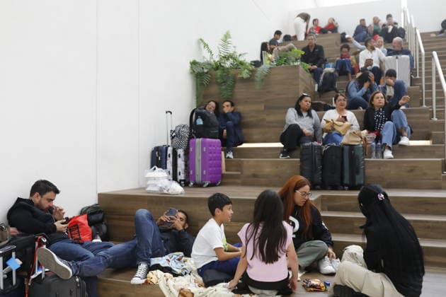 Security measures in Jalisco, Mexico amid volatile situation TLAJOMULCO DE ZUNIGA, MEXICO - FEBRUARY 23: Users of the Guadalajara International Airport wait for their departure flights that remain delayed in Tlajomulco de Zuniga, Jalisco, on February 23, 2026. The Jalisco state government urged residents to remain at home, suspended public transportation, and activated a red alert amid threats to public safety following a military operation targeting the Jalisco New Generation Cartel in the town of Tapalpa, about 130 kilometers (80 miles) south of Guadalajara, the capital of Jalisco state. Stringer Anadolu Guadalajara Mexico. Editorial use only. Please get in touch for any other usage.  Copyright: x2026xAnadoluxStringerx