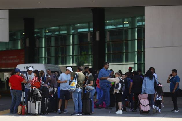 Security measures in Jalisco, Mexico amid volatile situation TLAJOMULCO DE ZUNIGA, MEXICO - FEBRUARY 23: Users of the Guadalajara International Airport wait for their departure flights that remain delayed in Tlajomulco de Zuniga, Jalisco, on February 23, 2026. The Jalisco state government urged residents to remain at home, suspended public transportation, and activated a red alert amid threats to public safety following a military operation targeting the Jalisco New Generation Cartel in the town of Tapalpa, about 130 kilometers (80 miles) south of Guadalajara, the capital of Jalisco state. Stringer Anadolu Guadalajara Mexico. Editorial use only. Please get in touch for any other usage.  Copyright: x2026xAnadoluxStringerx