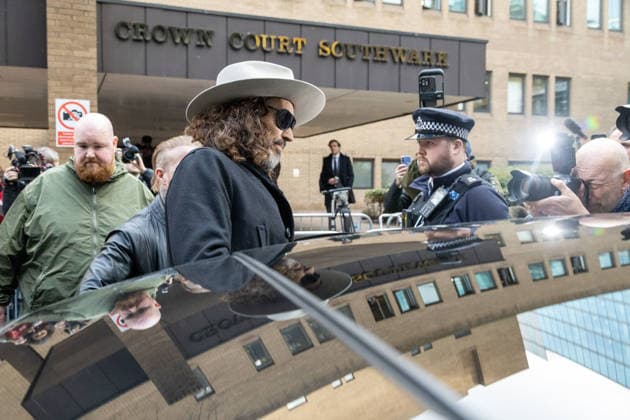 February 24, 2026, London, England, United Kingdom: RUSSELL BRAND departs Southwark Crown Court where he is accused of two further sex offences, including rape, against two further women which allegedly took place in 2009. Brand is already facing allegations of sexual offences against four other women and is due to go on trial in June 2026. London United Kingdom  - ZUMAs262 20260224_zip_s262_002 Copyright: xTayfunxSalcix
