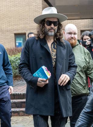 February 24, 2026, London, England, United Kingdom: RUSSELL BRAND leaves Southwark Crown Court where he is accused of two further sex offences, including rape, against two further women which allegedly took place in 2009. Brand is already facing allegations of sexual offences against four other women and is due to go on trial in June 2026. London United Kingdom - ZUMAs262 20260224_zip_s262_016 Copyright: xTayfunxSalcix