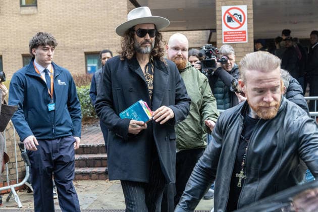 February 24, 2026, London, England, United Kingdom: RUSSELL BRAND leaves Southwark Crown Court where he is accused of two further sex offences, including rape, against two further women which allegedly took place in 2009. Brand is already facing allegations of sexual offences against four other women and is due to go on trial in June 2026. London United Kingdom  - ZUMAs262 20260224_zip_s262_019 Copyright: xTayfunxSalcix
