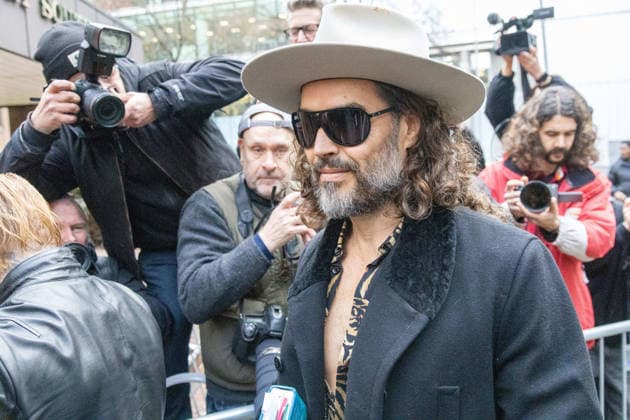 February 24, 2026, London, England, United Kingdom: RUSSELL BRAND arrives at Southwark Crown Court where he is accused of two further sex offences, including rape, against two further women which allegedly took place in 2009. Brand is already facing allegations of sexual offences against four other women and is due to go on trial in June 2026. London United Kingdom - ZUMAs262 20260224_zip_s262_034 Copyright: xTayfunxSalcix