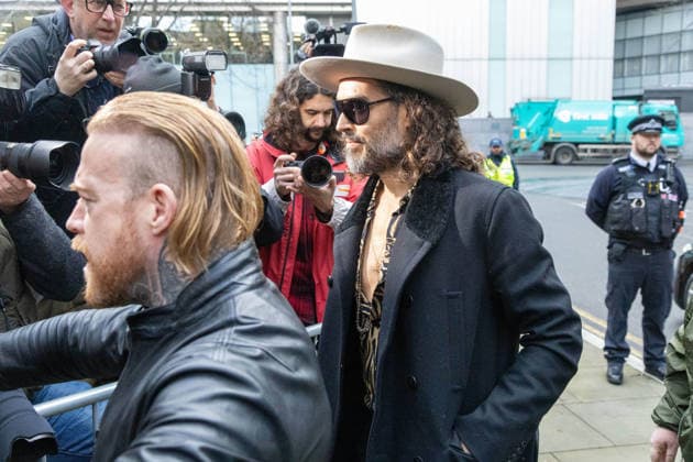 February 24, 2026, London, England, United Kingdom: RUSSELL BRAND arrives at Southwark Crown Court where he is accused of two further sex offences, including rape, against two further women which allegedly took place in 2009. Brand is already facing allegations of sexual offences against four other women and is due to go on trial in June 2026. London United Kingdom - ZUMAs262 20260224_zip_s262_035 Copyright: xTayfunxSalcix