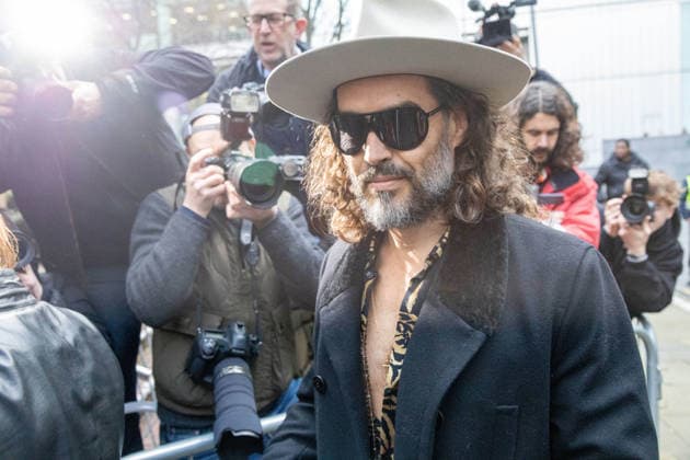 February 24, 2026, London, England, United Kingdom: RUSSELL BRAND arrives at Southwark Crown Court where he is accused of two further sex offences, including rape, against two further women which allegedly took place in 2009. Brand is already facing allegations of sexual offences against four other women and is due to go on trial in June 2026. London United Kingdom - ZUMAs262 20260224_zip_s262_042 Copyright: xTayfunxSalcix