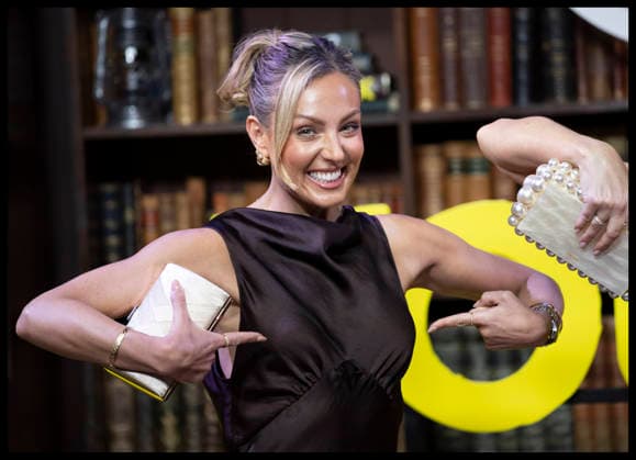 . 24 02 2026. London, United Kingdom. Dancer Amy Dowden points to her breasts as a reference to the fact that she has been treated for breast cancer, as she arrives at the Young Sherlock premiere in London.  xStephenxLockx xi-Imagesx IIM-26590-0020