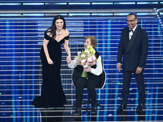 Sanremo, 76th Italian Song Festival - First Night. Pictured are Carlo Conti, Gianna Pratrsi, and Laura Pausini.  Copyright: xAlbertoxTerenghix xPoolxSanremox02x xipa-agency.netx xPoolxSanremox02x IPA_Agency_IPA71989461