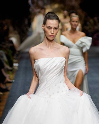 February 25, 2026, Melbourne, Victoria, Australia: A model wearing a design by Alin LeÃ¢â‚¬â ¢Kal walks at the Glam Up Runway show of the PayPal Melbourne Fashion Festival at the Royal Exhibition Building in Melbourne, Australia. Melbourne Australia  - ZUMAl303 20260225_aaf_l303_043 Copyright: xSydneyxLowx