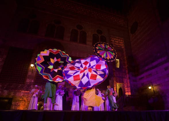 The traditional Ramadan custom Tennura dance in Egypt CAIRO, EGYPT - FEBRUARY 25: Tennura dance performances and Sufi music concerts are held daily throughout the holy month of Ramadan at Bayt al-Ghuri in Cairo on February 25, 2026. Wearing colorful skirts, embroidered vests, and white caps, Tennura performers spin around their axis while playing tambourines in rhythm with Sufi music, creating a vibrant and spiritual spectacle. Fareed Kotb Anadolu Cairo Egypt. Editorial use only. Please get in touch for any other usage.  Copyright: x2026xAnadoluxFareedxKotbx