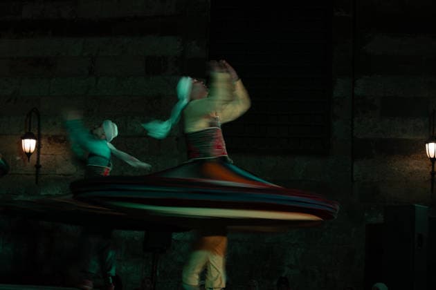 The traditional Ramadan custom Tennura dance in Egypt CAIRO, EGYPT - FEBRUARY 25: Tennura dance performances and Sufi music concerts are held daily throughout the holy month of Ramadan at Bayt al-Ghuri in Cairo on February 25, 2026. Wearing colorful skirts, embroidered vests, and white caps, Tennura performers spin around their axis while playing tambourines in rhythm with Sufi music, creating a vibrant and spiritual spectacle. Fareed Kotb Anadolu Cairo Egypt. Editorial use only. Please get in touch for any other usage.  Copyright: x2026xAnadoluxFareedxKotbx