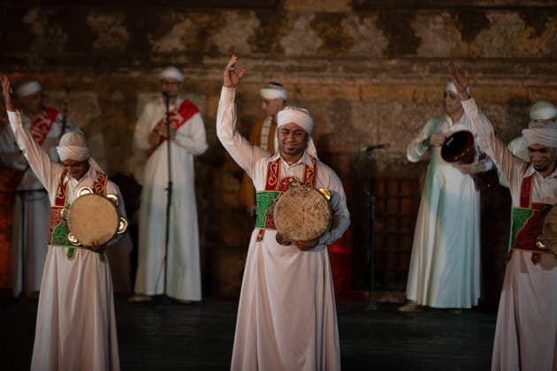 The traditional Ramadan custom Tennura dance in Egypt CAIRO, EGYPT - FEBRUARY 25: Tennura dance performances and Sufi music concerts are held daily throughout the holy month of Ramadan at Bayt al-Ghuri in Cairo on February 25, 2026. Wearing colorful skirts, embroidered vests, and white caps, Tennura performers spin around their axis while playing tambourines in rhythm with Sufi music, creating a vibrant and spiritual spectacle. Fareed Kotb Anadolu Cairo Egypt. Editorial use only. Please get in touch for any other usage.  Copyright: x2026xAnadoluxFareedxKotbx