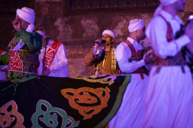 The traditional Ramadan custom Tennura dance in Egypt CAIRO, EGYPT - FEBRUARY 25: Tennura dance performances and Sufi music concerts are held daily throughout the holy month of Ramadan at Bayt al-Ghuri in Cairo on February 25, 2026. Wearing colorful skirts, embroidered vests, and white caps, Tennura performers spin around their axis while playing tambourines in rhythm with Sufi music, creating a vibrant and spiritual spectacle. Fareed Kotb Anadolu Cairo Egypt. Editorial use only. Please get in touch for any other usage.  Copyright: x2026xAnadoluxFareedxKotbx