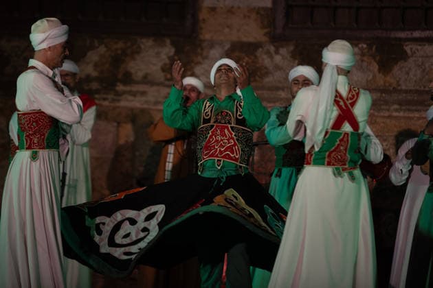 The traditional Ramadan custom Tennura dance in Egypt CAIRO, EGYPT - FEBRUARY 25: Tennura dance performances and Sufi music concerts are held daily throughout the holy month of Ramadan at Bayt al-Ghuri in Cairo on February 25, 2026. Wearing colorful skirts, embroidered vests, and white caps, Tennura performers spin around their axis while playing tambourines in rhythm with Sufi music, creating a vibrant and spiritual spectacle. Fareed Kotb Anadolu Cairo Egypt. Editorial use only. Please get in touch for any other usage.  Copyright: x2026xAnadoluxFareedxKotbx