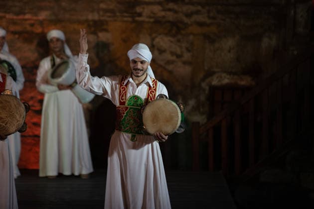 The traditional Ramadan custom Tennura dance in Egypt CAIRO, EGYPT - FEBRUARY 25: Tennura dance performances and Sufi music concerts are held daily throughout the holy month of Ramadan at Bayt al-Ghuri in Cairo on February 25, 2026. Wearing colorful skirts, embroidered vests, and white caps, Tennura performers spin around their axis while playing tambourines in rhythm with Sufi music, creating a vibrant and spiritual spectacle. Fareed Kotb Anadolu Cairo Egypt. Editorial use only. Please get in touch for any other usage.  Copyright: x2026xAnadoluxFareedxKotbx