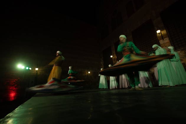The traditional Ramadan custom Tennura dance in Egypt CAIRO, EGYPT - FEBRUARY 25: Tennura dance performances and Sufi music concerts are held daily throughout the holy month of Ramadan at Bayt al-Ghuri in Cairo on February 25, 2026. Wearing colorful skirts, embroidered vests, and white caps, Tennura performers spin around their axis while playing tambourines in rhythm with Sufi music, creating a vibrant and spiritual spectacle. Fareed Kotb Anadolu Cairo Egypt. Editorial use only. Please get in touch for any other usage.  Copyright: x2026xAnadoluxFareedxKotbx