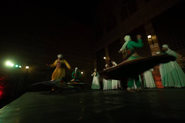 The traditional Ramadan custom Tennura dance in Egypt CAIRO, EGYPT - FEBRUARY 25: Tennura dance performances and Sufi music concerts are held daily throughout the holy month of Ramadan at Bayt al-Ghuri in Cairo on February 25, 2026. Wearing colorful skirts, embroidered vests, and white caps, Tennura performers spin around their axis while playing tambourines in rhythm with Sufi music, creating a vibrant and spiritual spectacle. Fareed Kotb Anadolu Cairo Egypt. Editorial use only. Please get in touch for any other usage.  Copyright: x2026xAnadoluxFareedxKotbx