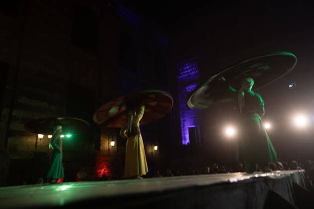 The traditional Ramadan custom Tennura dance in Egypt CAIRO, EGYPT - FEBRUARY 25: Tennura dance performances and Sufi music concerts are held daily throughout the holy month of Ramadan at Bayt al-Ghuri in Cairo on February 25, 2026. Wearing colorful skirts, embroidered vests, and white caps, Tennura performers spin around their axis while playing tambourines in rhythm with Sufi music, creating a vibrant and spiritual spectacle. Fareed Kotb Anadolu Cairo Egypt. Editorial use only. Please get in touch for any other usage.  Copyright: x2026xAnadoluxFareedxKotbx