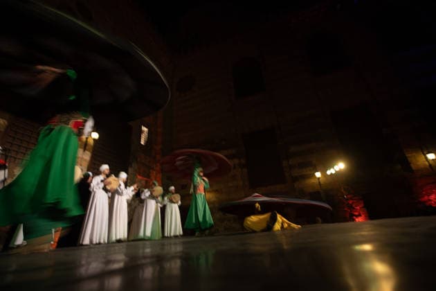 The traditional Ramadan custom Tennura dance in Egypt CAIRO, EGYPT - FEBRUARY 25: Tennura dance performances and Sufi music concerts are held daily throughout the holy month of Ramadan at Bayt al-Ghuri in Cairo on February 25, 2026. Wearing colorful skirts, embroidered vests, and white caps, Tennura performers spin around their axis while playing tambourines in rhythm with Sufi music, creating a vibrant and spiritual spectacle. Fareed Kotb Anadolu Cairo Egypt. Editorial use only. Please get in touch for any other usage.  Copyright: x2026xAnadoluxFareedxKotbx