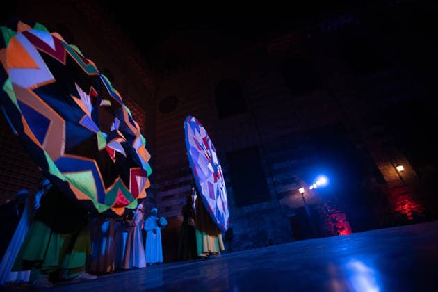 The traditional Ramadan custom Tennura dance in Egypt CAIRO, EGYPT - FEBRUARY 25: Tennura dance performances and Sufi music concerts are held daily throughout the holy month of Ramadan at Bayt al-Ghuri in Cairo on February 25, 2026. Wearing colorful skirts, embroidered vests, and white caps, Tennura performers spin around their axis while playing tambourines in rhythm with Sufi music, creating a vibrant and spiritual spectacle. Fareed Kotb Anadolu Cairo Egypt. Editorial use only. Please get in touch for any other usage.  Copyright: x2026xAnadoluxFareedxKotbx