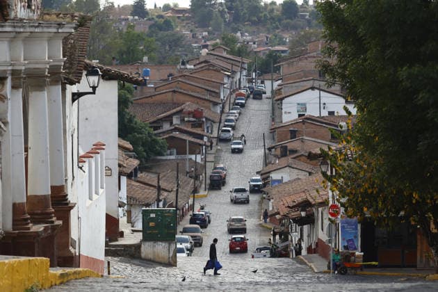Life in Tapalpa after military operation that killed cartel leader El Mencho TAPALPA, MEXICO - FEBRUARY 25: People walk through the streets of the Tapalpa town center after a military operation that killed cartel leader Nemesio Oseguera, El Mencho , in Tapalpa, Mexico. on February 25, 2026. Stringer Anadolu Tapalpa Mexico. Editorial use only. Please get in touch for any other usage.  Copyright: x2026xAnadoluxStringerx
