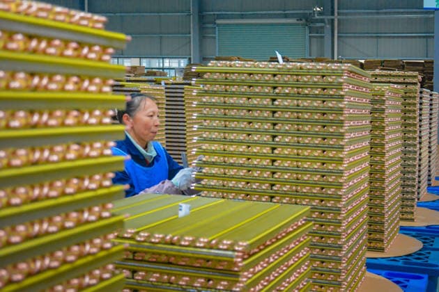 China Manufacturing Industry ANQING, CHINA - FEBRUARY 26, 2026 - A worker from Anhui Meibo New Energy Technology Co., Ltd. is producing air conditioning heat exchangers in Yuexi Economic Development Zone, Anqing City, Anhui Province, on February 26, 2026. Anqing Anhui China  Copyright: xCFOTOx i1772111231673