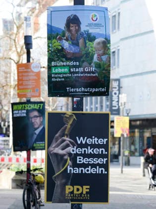 Wahlplakate der Tierschutzpartei und der Partei des Fortschritts PDF sind an einem Laternenmast befestigt, Landtag und Wahlwerbung, Landtagswahl in Baden Wuerttemberg 2026, Innenstadt am 26. February 2026 in Stuttgart, Deutschland. (Foto von Marco Steinbrenner DeFodi Images) Election posters for the Animal Protection Party and the Party of Progress PDF are attached to a lamppost, Landtag und Wahlwerbung, Landtagswahl in Baden Wuerttemberg 2026, City centre, February 26, 2026 in Stuttgart, Germany. (Photo by Marco Steinbrenner DeFodi Images)