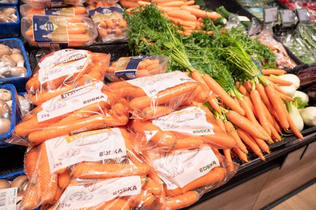 Freshness Carrots, Vegetables in the Display one supermarket, Shopping from healthy Foodstuffs, Purchasing from Food in Trier, Germany 1133606019