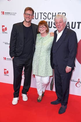 Rolf Zuckowski with his wife Monika Zuckowski and son Alexander Ali Zuckowski at the 17 GERMAN MUSIC AUTHORINNEN PRIZE at The Ritz Carlton in Berlin on 26 02 2026