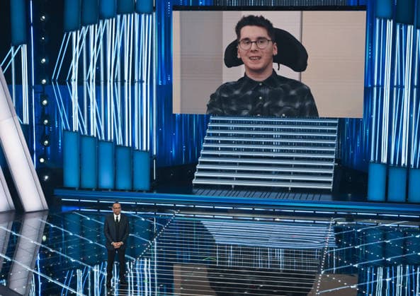 February 26, 2026, Sanremo, ITALY: Sanremo Festival host and artistic director Carlo Conti and Paolo Sarullo on the screen on stage at the Ariston theatre during the 76th edition of the Sanremo Italian Song Festival, in Sanremo, Italy, 26 February 2026. The Music Festival runs from 24 to 28 February 2026. ANSA ETTORE FERRARI Sanremo ITALY  - ZUMAa110 20260226_zaf_a110_167 Copyright: xEttorexFerrarix