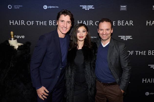 February 26, 2026, Toronto, On, Canada: Former Prime Minister Justin Trudeau, left to right, actress Malia Baker and director Alexandre Trudeau are photographed at a private screening of Alexandre Trudeau s film Hair of the Bear, in Toronto, on Thursday, Feb. 26, 2026. Toronto Canada - ZUMAc35_ 20260226_zaf_c35_119 Copyright: xSammyxKoganx