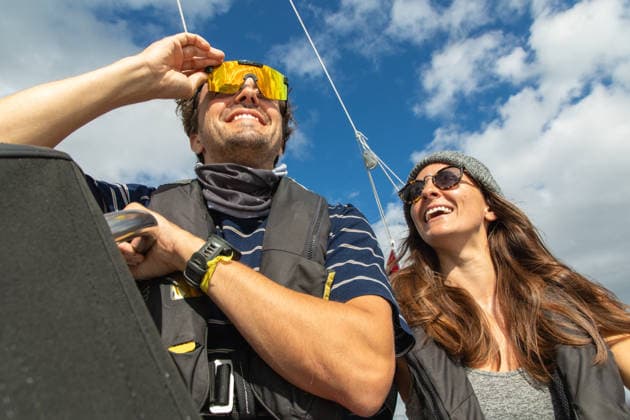 Couple enjoying boat ride through scenic Norwegian waters A joyful couple relishes a sunny day on a boat in Norway, surrounded by breathtaking scenery. Embracing nautical adventure, they smile under the clear blue skies. Model Released Robcabphotography_ID33004_1123718_005 Copyright: xRobcabphotographyx RECORD DATE NOT STATED